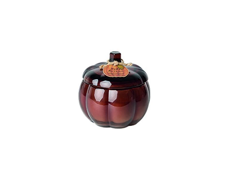 Candle in a glass pumpkin